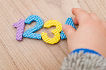 Two year boy plays with Foam Puzzle Mat Learning numbers. counting Study Kids numeric Floor Play toy Education Learning Toys