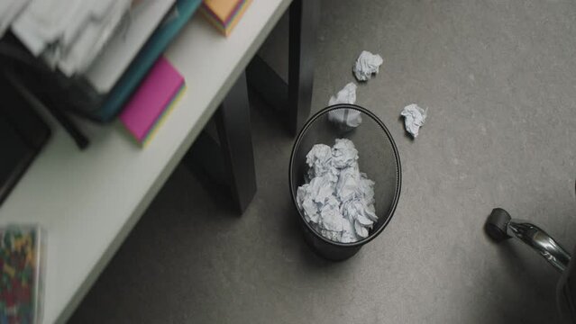 Failing to throw crumpled papers in to the recycle bin