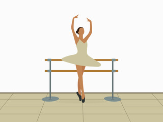Ballerina dancing near the ballet barn indoors