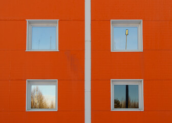 White windows on orange wall background