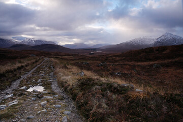 Track leading to distant hills on Rannoch Moor in Scottish Highlands