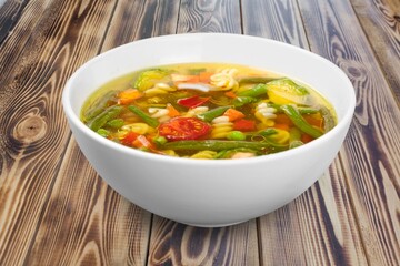 Tasty traditional dish food in the bowl on the desk