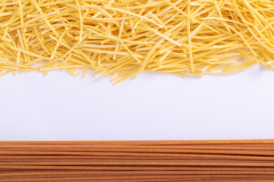Spagetti and macaroni background with white space for text.