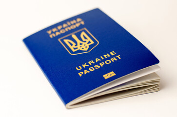 Ukrainian passport on a white background, selective focus