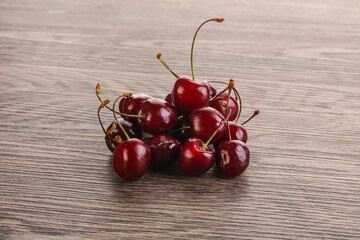 Ripe sweet cherry berries heap