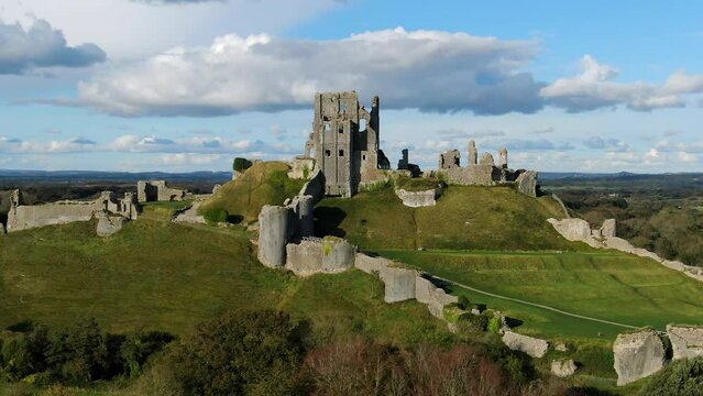 Aerial footage of Corfe Castle, Corfe, Isle of Purbeck, Dorset, England