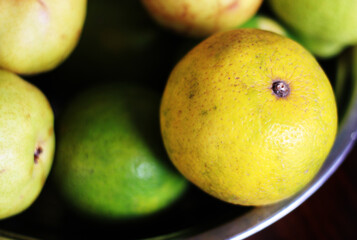 Lemons in the bowl. Yellow lemon