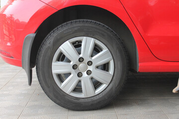 Plakat car wheel isolated of red car 