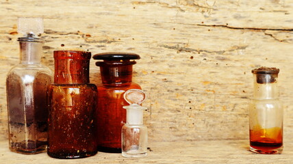Antique Medicine Bottles, Victorian Era, on a original 1800s wooden background with space for your text or design