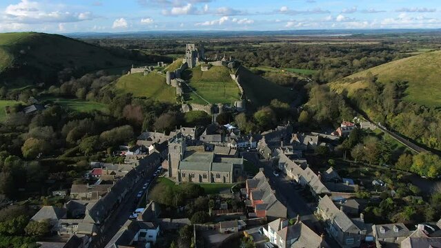 Aerial footage of Corfe Castle, Corfe, Isle of Purbeck, Dorset, England