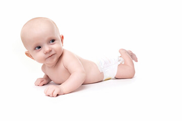 baby on a white isolated background in a diaper