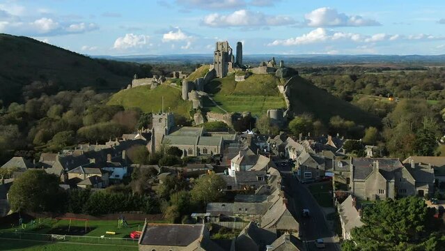 Aerial footage of Corfe Castle, Corfe, Isle of Purbeck, Dorset, England
