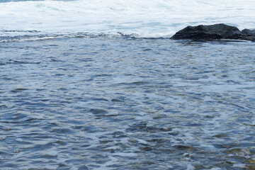 Blue sea water between the rocks (part 2)