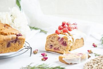 Delicious Raspberry loaf cake or loaf bread with lemon glaze.