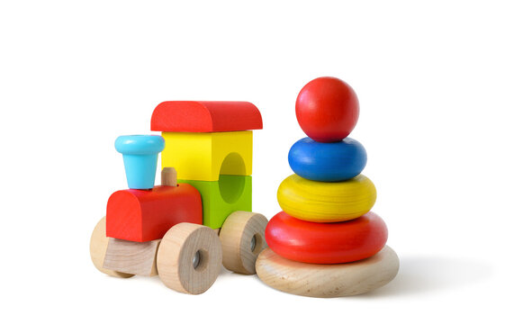 Colorful wooden toys isolated on white background