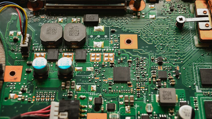 Electronic circuit board close up.