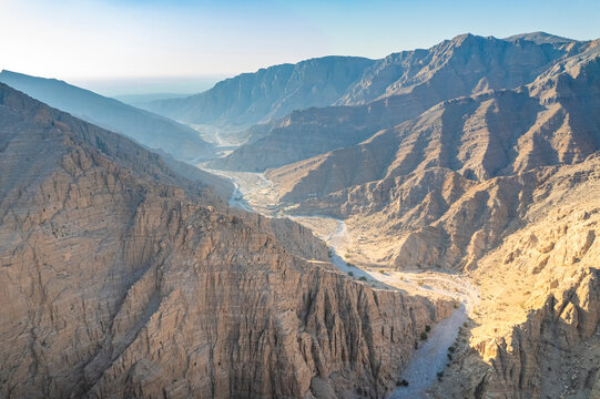 Aerial view of Wadi Shawqa, a canyon among the rocky hills in Ras al-Khaimah, United Arab Emirates.