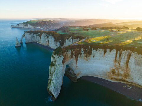 Aerial view of Aval Gate in Etretat at sunrise, Normandy, France.