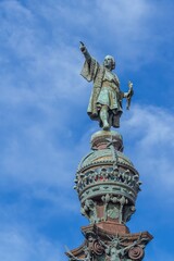 Fototapeta na wymiar Christopher Columbus statue with blue sky in Barcelona (Spain).