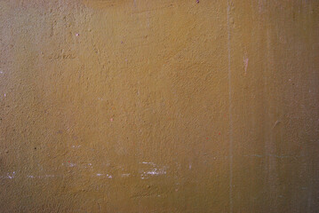 Textura de pared exterior con grano fino pintada en tonos verdes. Textura de fondo verde o textura de pared verde sobre fondo de pared de cemento