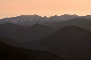Aerial view of mountain landscape at sunset over the Rocky Mountains in Boulder, Colorado, United States.