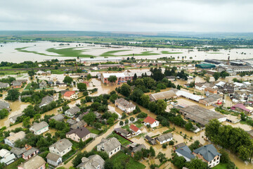 Aerial view of flooded houses with dirty water of Dnister river in Halych town, western Ukraine