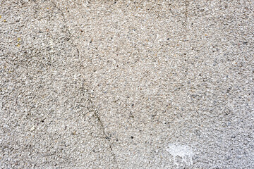 surface of concrete gray wall  in cracks