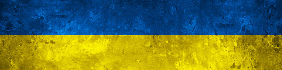 Ukrainian flag background banner panorama - Old rustic damaged concrete stone wall texture background, painted in the colors of the flag of Ukraine