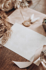 bridal accessories such as shoes, bouquet , ring and perfume lie on a table