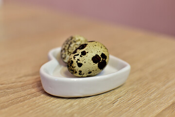 Quail eggs on a saucer