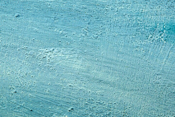 abstract background: light textured plaster, color toning, close