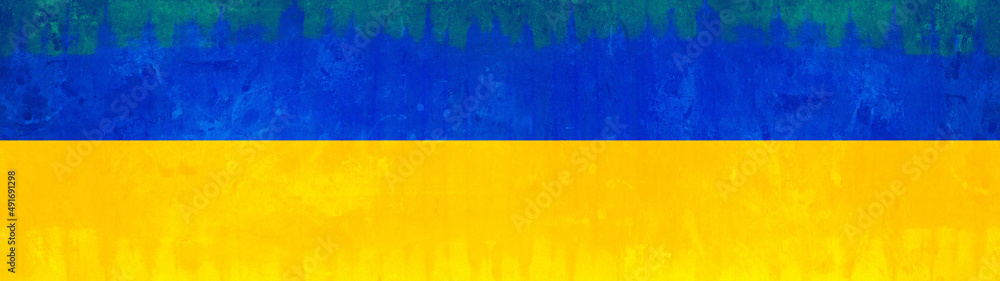 Wall mural Ukrainian flag background banner panorama - Old rustic damaged concrete stone wall texture background, painted in the colors of the flag of Ukraine