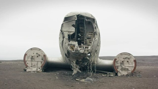 Front of the abandoned plane wreck dc3 on black vulcanic beach in S&oacute;lheimasandur, Iceland