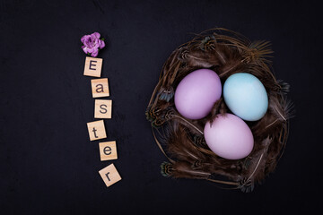 Happy easter trendy card with colored eggs on dark background