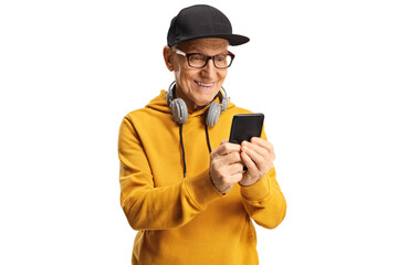 Trendy elderly man with headphones and a smartphone