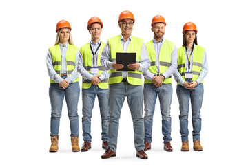 Team of male and female site engineers with a safety vest and hardhats
