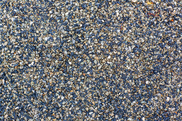 Sea stones background. Colorful small pebbles or stone in garden. Flat lay of sea stones texture background. Abstract shape pattern from nature.