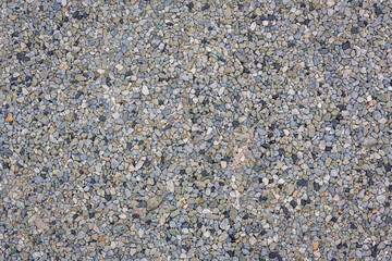 Sea stones background. Colorful small pebbles or stone in garden. Flat lay of sea stones texture background. Abstract shape pattern from nature.