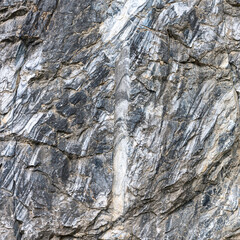 Marble surface with veins and a beautiful pattern on an industrial quarry. Karelia. Russia