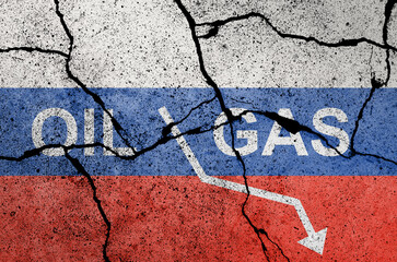 Flag of Russia painted on a concrete wall with word OIL GAS