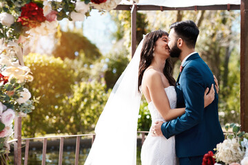 Im so glad I get to kiss you for the rest of my life. Cropped shot of an affectionate young...
