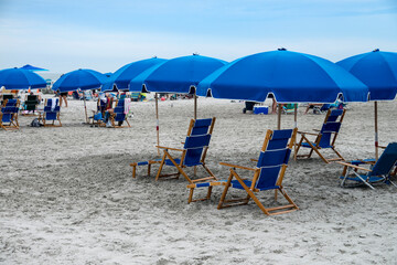 beach chairs and umbrella on beach