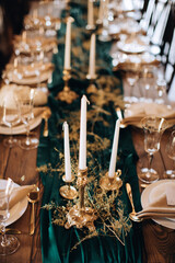 Fototapeta na wymiar Beautiful boho wedding table decor with candles