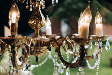 Golden vintage glass lamp chandelier in restaurant