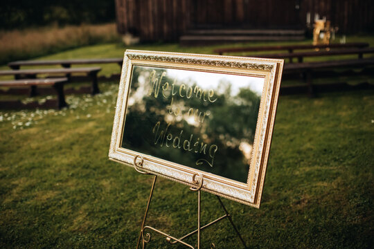 Mirror Board Welcome to our wedding. Greetings on a vintage mirror