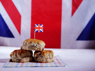 English traditional fresh baked scones on Union Jack background