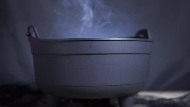 Halloween cauldron with spell potion brewing