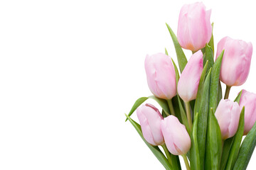 Fresh pink tulip flowers bouquet on shelf in front of wooden wall.