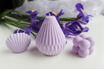 a set of handmade soy candles made of natural soy wax. color of the year very peri 