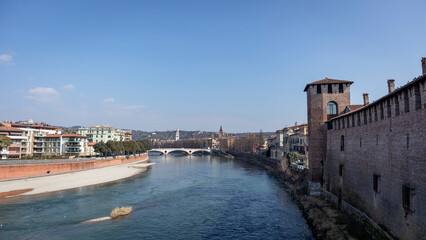 Obraz premium Images of the city of Verona in Italy. Classic buildings, bridges over the Adige river and churches of the city.